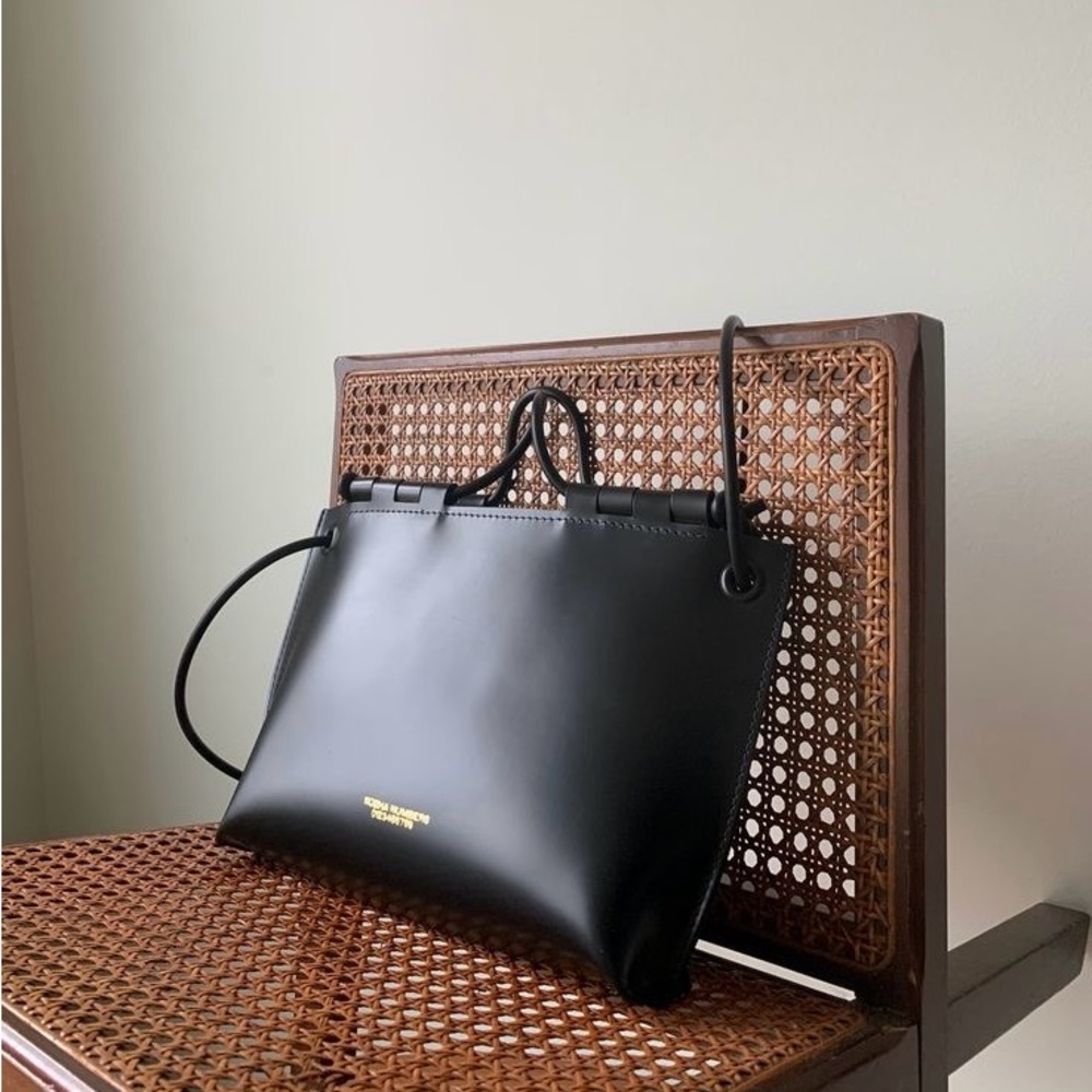 KOZHA NUMBERS THE GRANDE SIESTA IN BLACK